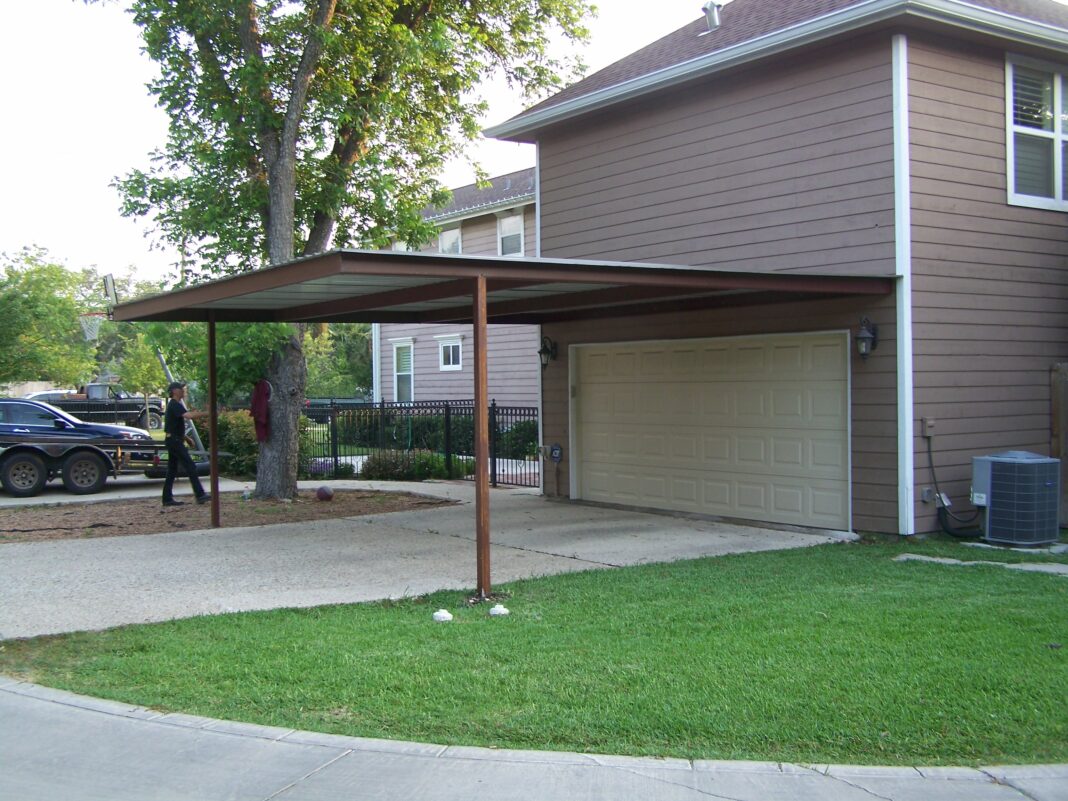 How do you attach a carport to a house roof?