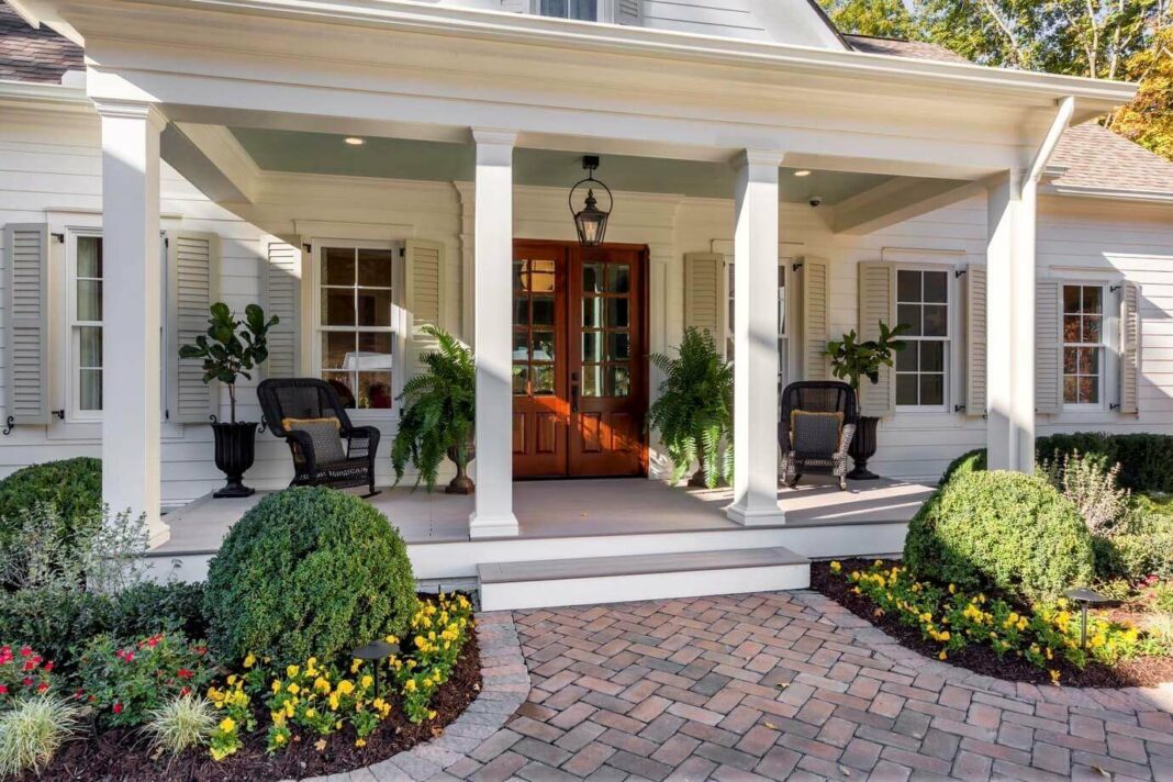 How much does it cost to add a wrap around porch?