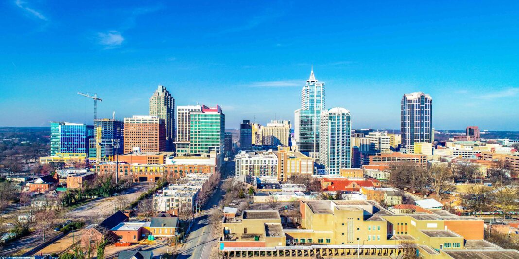 Which city is safer Charlotte or Raleigh?